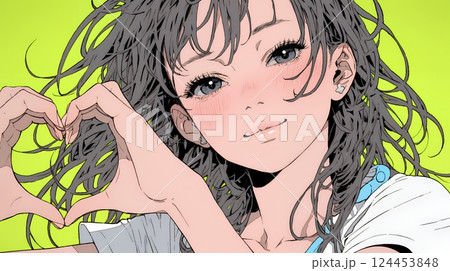手指でハートサインを作っている若い女性