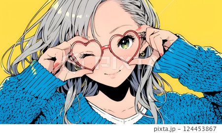 手指でハートサインを作っている若い女性