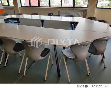 Chair and table in empty business conference office. Modern workplace interior, nobody Chair and table in empty business conference office. Modern workplace interior, nobody 124454878