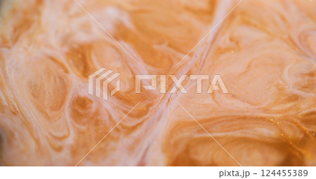 Ripple paint. Shiny fluid. Blur golden yellow white color marble texture chemical liquid acrylic spreading on abstract background. Ripple paint. Shiny fluid. Blur golden yellow white color marble texture chemical liquid acrylic spreading on abstract background. 124455389