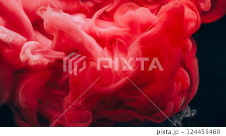 Pigment splash. Fume paint explosion. Red vapor stream swirl mix shape on black background. Blur color haze abstract dye drop wave spill. Pigment splash. Fume paint explosion. Red vapor stream swirl mix shape on black background. Blur color haze abstract dye drop wave spill. 124455460