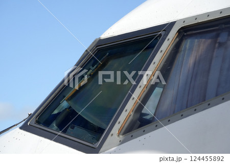airplane detail of cockpit window exterior view airplane detail of cockpit window exterior view 124455892