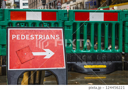 Street Construction Area with Directional Sign for Pedestrian Safety Street Construction Area with Directional Sign for Pedestrian Safety 124456221
