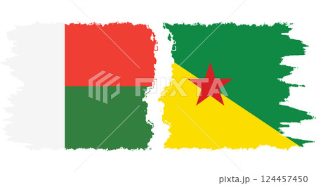 French Guiana and Madagascar grunge flags connection vector French Guiana and Madagascar grunge flags connection vector 124457450