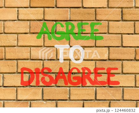 Agree to disagree symbol. Concept words Agree to disagree on beautiful brick wall . Beautiful brick wall background. Business and agree to disagree concept. Copy space. Agree to disagree symbol. Concept words Agree to disagree on beautiful brick wall . Beautiful brick wall background. Business and agree to disagree concept. Copy space. 124460832