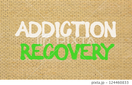 Addiction recovery symbol. Concept words Addiction recovery on beautiful brick wall. Beautiful brick wall background. Psychology addiction recovery concept. Copy space. Addiction recovery symbol. Concept words Addiction recovery on beautiful brick wall. Beautiful brick wall background. Psychology addiction recovery concept. Copy space. 124460833