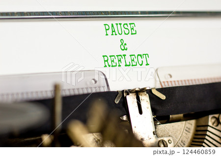 Pause and reflect symbol. Concept words Pause and reflect typed on beautiful retro typewriter. Beautiful white paper background. Business motivational lifestyle pause and reflect concept. Copy space. Pause and reflect symbol. Concept words Pause and reflect typed on beautiful retro typewriter. Beautiful white paper background. Business motivational lifestyle pause and reflect concept. Copy space. 124460859