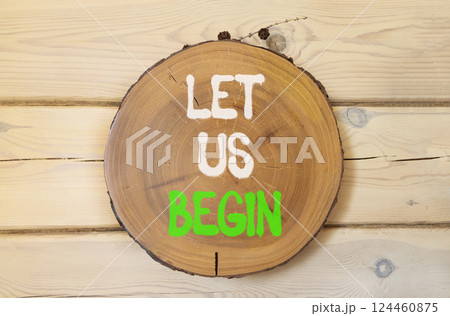 Let us begin symbol. Concept words Let us begin on beautiful wooden circle. Beautiful wooden wall wooden background. Business motivational let us begin concept. Copy space. Let us begin symbol. Concept words Let us begin on beautiful wooden circle. Beautiful wooden wall wooden background. Business motivational let us begin concept. Copy space. 124460875