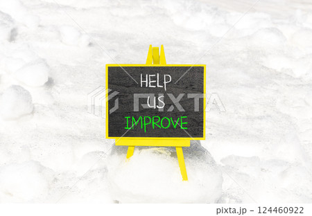 Help us improve symbol. Concept words Help us improve on beautiful black yellow blackboard. Beautiful white snow background. Business motivational help us improve concept. Copy space. 124460922