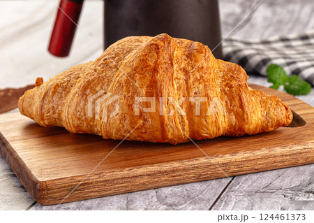Fresh hot homemade croissant for breakfast Fresh hot homemade croissant for breakfast 124461373