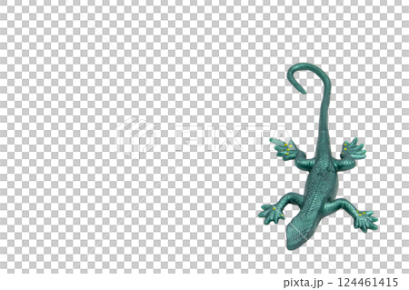 Green rubber lizard toy, top view, no background. Playful and fun, perfect for children's designs, educational materials or toy store advertising. 124461415