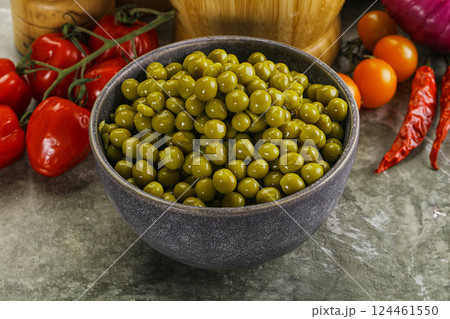 Sweet canned young green peas 124461550