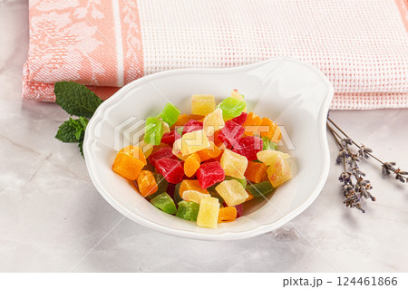 Sweet candied papaya colorful pieses 124461866