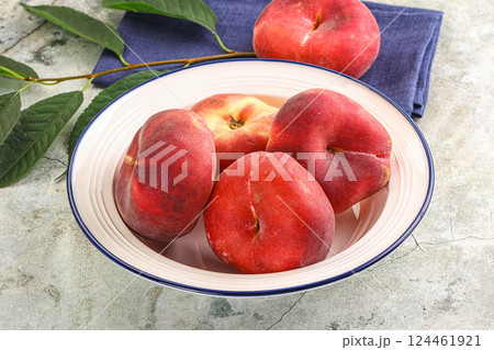 Ripe sweet and juicy Flat peach Ripe sweet and juicy Flat peach 124461921