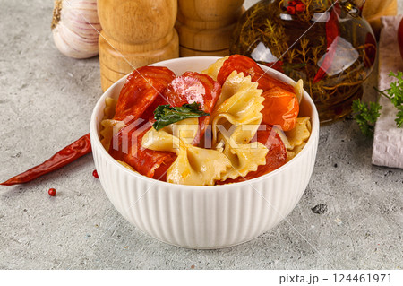 Italian pasta farfalle with pepperoni 124461971