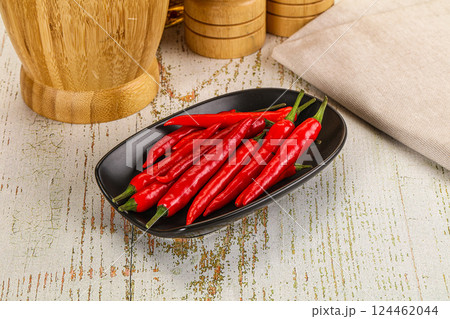 Red hot chili pepper heap 124462044