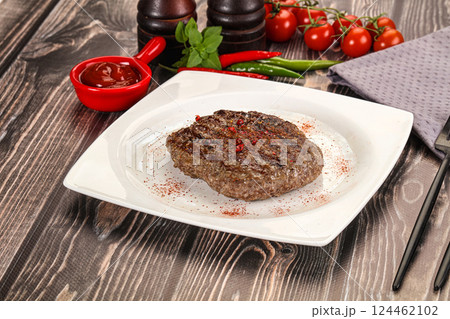 Grilled beef burger cutlet with sauce 124462102