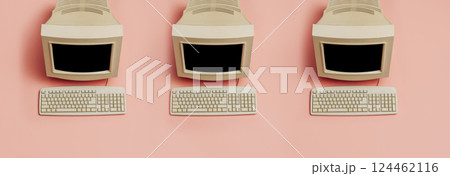 three Vintage PC on pink background, top view. Monitor and keyboard as in 90s 124462116