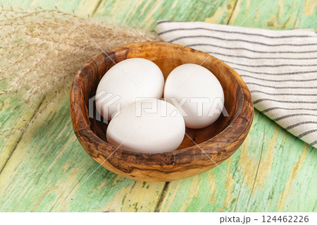 Raw white uncooked chicken eggs Raw white uncooked chicken eggs 124462226