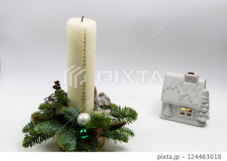 Christmas advent candle whith numbers. Christmas decor and holiday preparations 124463018
