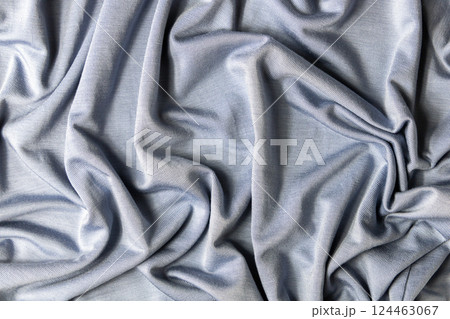 Textile background soft and shiny silk texture. Textile background soft and shiny silk texture. 124463067