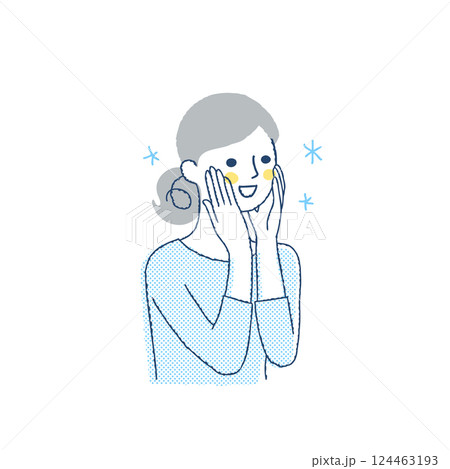 頬に手を当てて喜んでいる女性 124463193