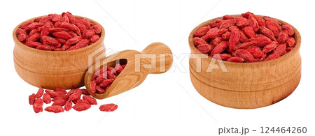 Dried goji berries in wooden bowl and scoop isolated on white background 124464260