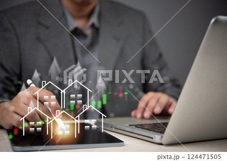 professional working on property sale with finance chart, technology support, and housing market analysis for business growth. real estate marketing with house investment planning, and mortgage loan 124471505