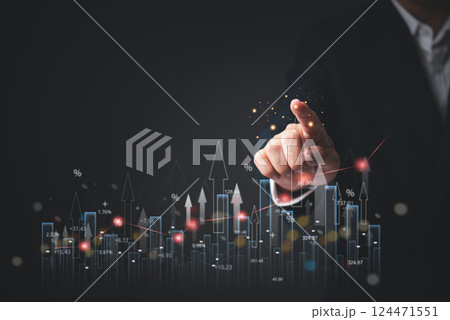 businessman analyzing financial growth charts and pointing at rising bar graphs marketing with futuristic data visualization. investment growth trends, and economic business stock market businessman analyzing financial growth charts and pointing at rising bar graphs marketing with futuristic data visualization. investment growth trends, and economic business stock market 124471551