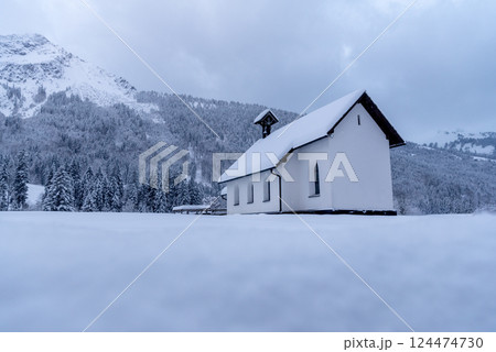 Church minimalist in winter scenery, low angle view in the Bavarian Alps, Germany 124474730