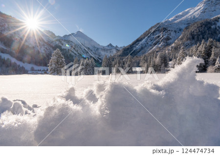 Deep snow scenery on a sunny day in December in the Bavarian Alps, Germany Deep snow scenery on a sunny day in December in the Bavarian Alps, Germany 124474734