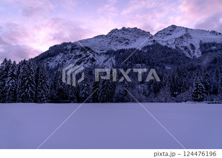 Winter scenery at sunset with snow-covered nature in the Bavarian Alps, Germany Winter scenery at sunset with snow-covered nature in the Bavarian Alps, Germany 124476196