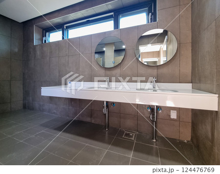 interior of a public toilet interior of a public toilet 124476769
