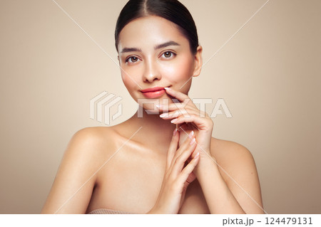 Portrait beautiful young woman with clean fresh skin Portrait beautiful young woman with clean fresh skin 124479131