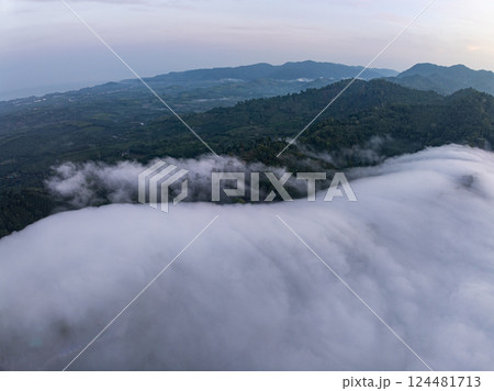 Aerial view Beautiful natural landscape Rainforest mountains in the sunrise or sunset time,Natural scenery tropical forest and fog in asia,Wide angle view drone shot Aerial view Beautiful natural landscape Rainforest mountains in the sunrise or sunset time,Natural scenery tropical forest and fog in asia,Wide angle view drone shot 124481713