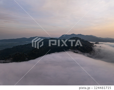 Aerial view Beautiful natural landscape Rainforest mountains in the sunrise or sunset time,Natural scenery tropical forest and fog in asia,Wide angle view drone shot 124481715