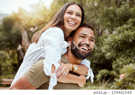 Love, happy and nature with couple and piggy back for spring, peace and relax in countryside park together. Smile, freedom and summer with man and woman hug for holiday, trees and grass field Love, happy and nature with couple and piggy back for spring, peace and relax in countryside park together. Smile, freedom and summer with man and woman hug for holiday, trees and grass field 124482548