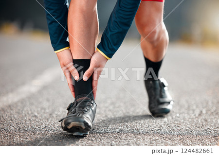 Run injury, feet and sport runner athlete on a outdoor road feeling ankle and sports pain. Leg muscle strain accident from sports training, running and workout exercise busy with fitness cardio Run injury, feet and sport runner athlete on a outdoor road feeling ankle and sports pain. Leg muscle strain accident from sports training, running and workout exercise busy with fitness cardio 124482661
