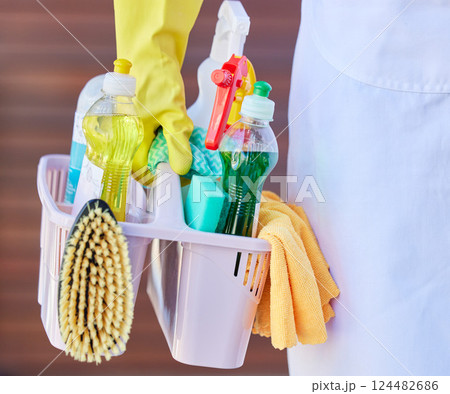 Cleaning, tools and cleaner carrying basket with liquid soap, brush and detergent spray bottle. Closeup of products for washing, hygiene and clean supplies for housekeeper, maid or domestic worker 124482686