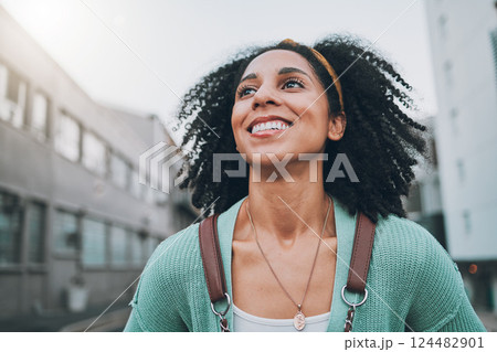 Black woman, city travel and smile with exchange student holding backpack and feel happy looking at buildings and walking down street. Female, motivation and vision for urban opportunity in London 124482901