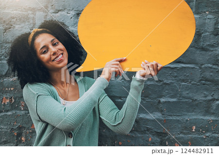 Speech bubble, contact us and woman with communication social media icon with mockup space against a wall outdoors. Smile, good news and happy girl with networking, feedback and marketing sign 124482911