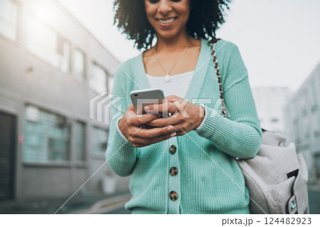 Phone, networking and black woman with mobile app, social media post or 5g internet outdoor with in a urban city. Happy african gen z girl typing on her cellphone for online post and contact with app Phone, networking and black woman with mobile app, social media post or 5g internet outdoor with in a urban city. Happy african gen z girl typing on her cellphone for online post and contact with app 124482923