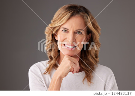 Mature woman, beauty and skincare for healthy skin, smile and happiness against mockup studio background. Face portrait of happy lady model posing for cosmetology, wellness or dermatology advertising Mature woman, beauty and skincare for healthy skin, smile and happiness against mockup studio background. Face portrait of happy lady model posing for cosmetology, wellness or dermatology advertising 124483137