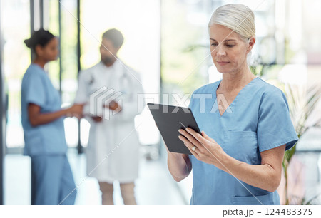Nurse, tablet and hospital, health and woman check patient information, technology with digital medical data. Clinic, nursing and online medicine report, mature person and healthcare professional. 124483375