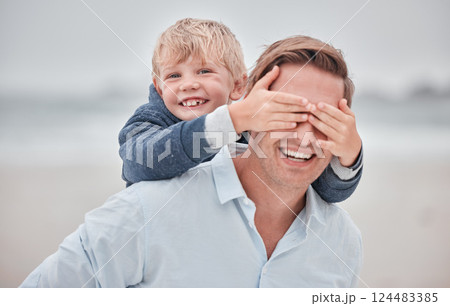 Father, child and hands on eyes in piggyback for playful fun, happiness or bonding together in the outdoors. Portrait smile of happy dad and kid playing in joy for back ride, free time and moments 124483385