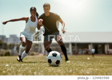 Friends, soccer player and soccer training game on football field for fitness workout on grass outdoor football pitch for body or cardiovascular health. People, soccer ball and summer run in Brazil Friends, soccer player and soccer training game on football field for fitness workout on grass outdoor football pitch for body or cardiovascular health. People, soccer ball and summer run in Brazil 124483560