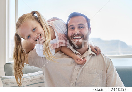Love, father and girl being happy, smile and bonding doing hug, embrace and being together on sofa in living room. Male dad, daughter and child have fun, laugh and happiness in lounge on sofa and joy 124483573