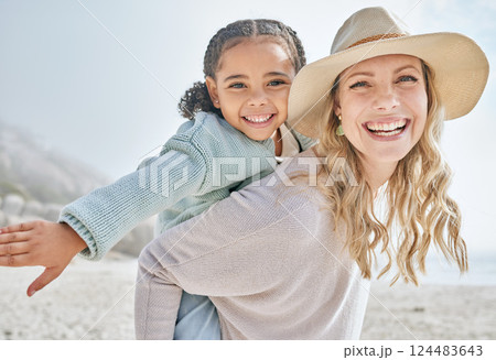 Beach, foster and portrait with piggy back bonding with black child on California holiday. Adoption, vacation and love in interracial family with happy smile of kid and mom at the ocean. 124483643