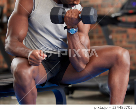 Fitness, gym and dumbbell of bodybuilder black man arm for muscle development, exercise and workout. Strong athlete in sports training and weightlifting for bodybuilding strength and healthy body 124483703