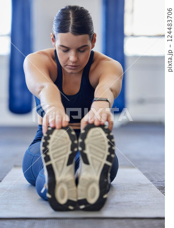 Yoga, woman and stretching for meditation, fitness and wellness for fitness, health and workout on yoga mat for focus. Female athlete, healthy lady and breath balance exercise, training or sportswear 124483706